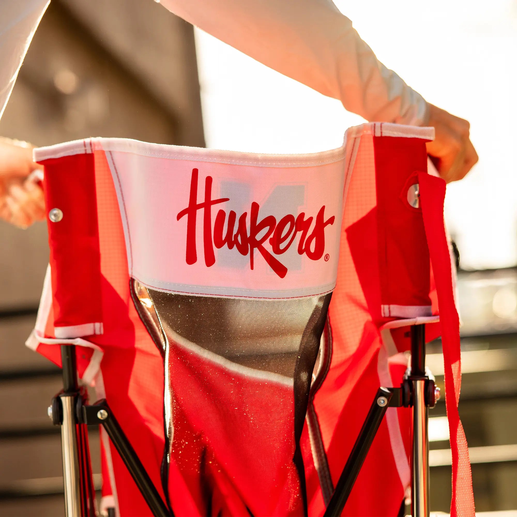 Luxury Camp College Comfort Pro Rocker - Nebraska Cornhuskers - Choice 161 - Patented Spring-Action Rocking Chair for Camping Detail